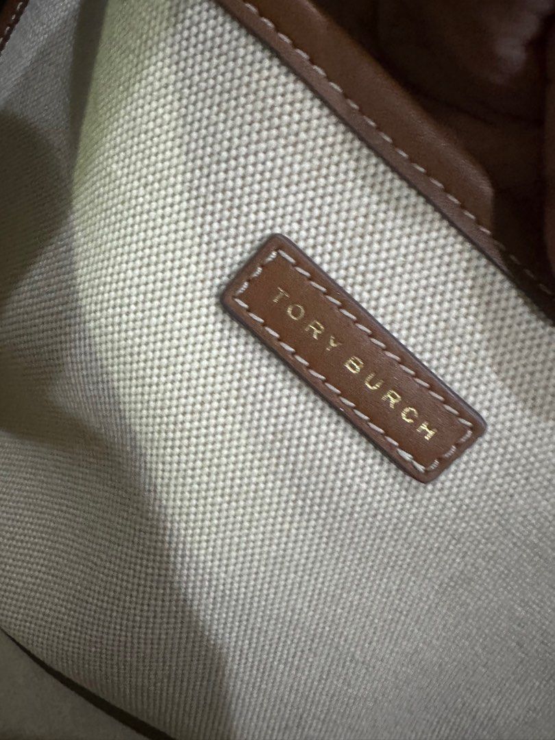 Authentic Tory Burch Blake Canvas Tote bag (Category: Luxury Bags & Wallets) located in Pasig City. Submitted by marikondolifeph (Listing ID 1280242545, Image 3). Description: Authentic Canada bought Color is Natural/Classic Cuoio Gold tone hardware Can be worn 2 ways I still have the paper bag, plastic and cartons included with this Like Lv on the go shape and size Canvas material Leather trim Interior open compartment 1 interior zip compartment