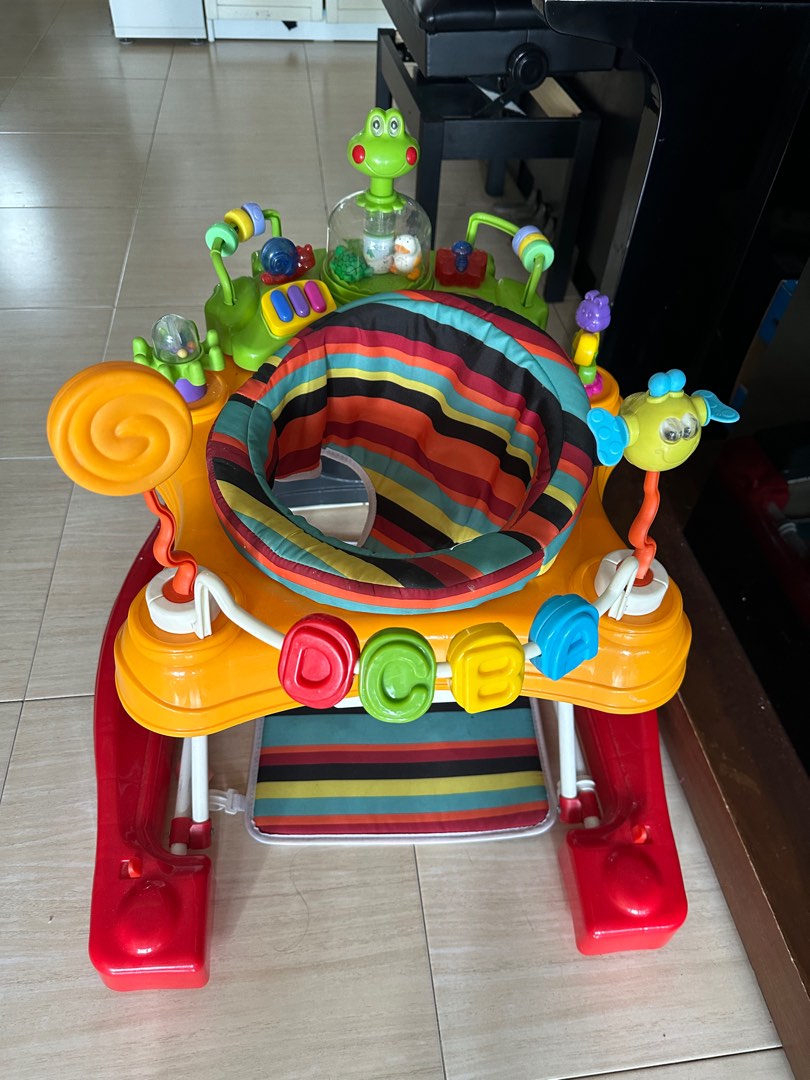 Saucer hot sale walker baby