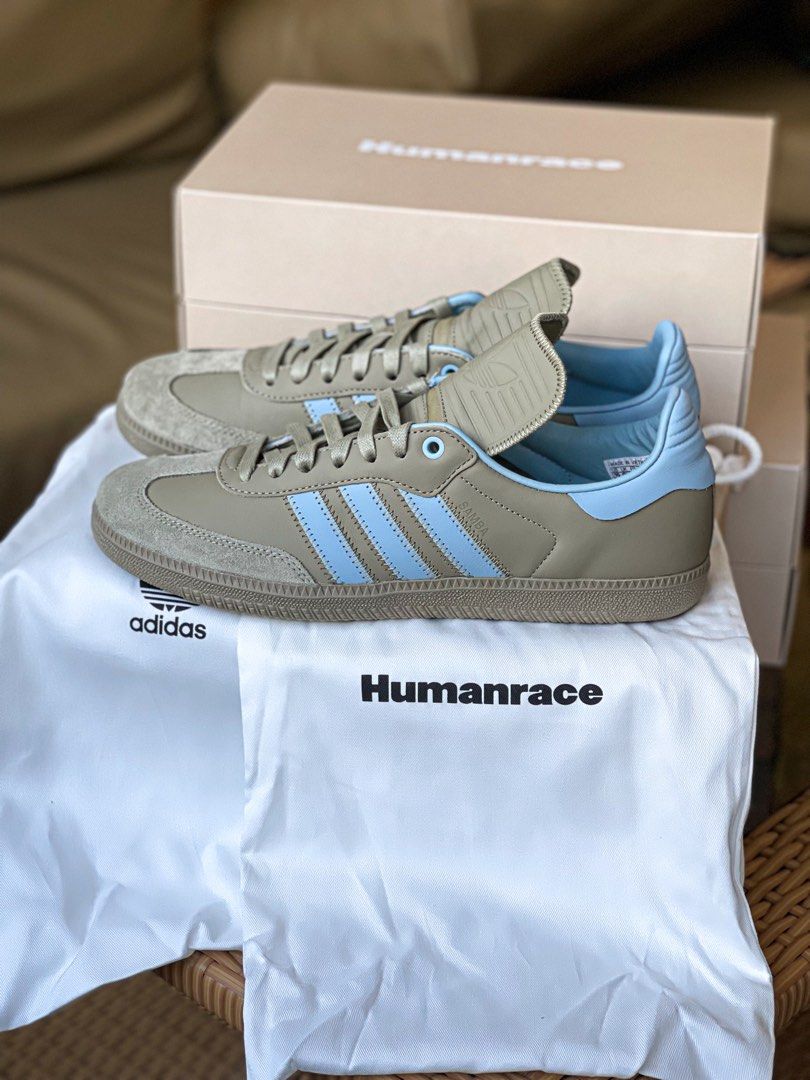 Adidas human race top retail