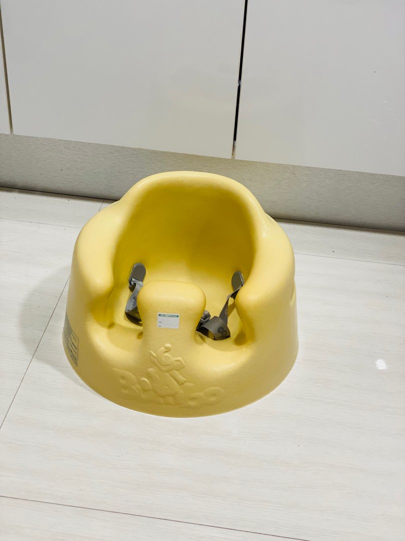 Yellow bumbo seat sales