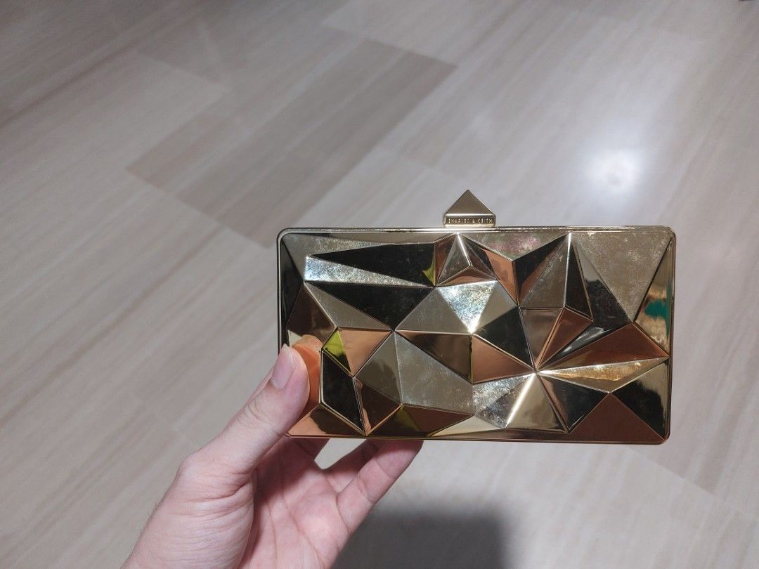 Geometric clutch bag on sale