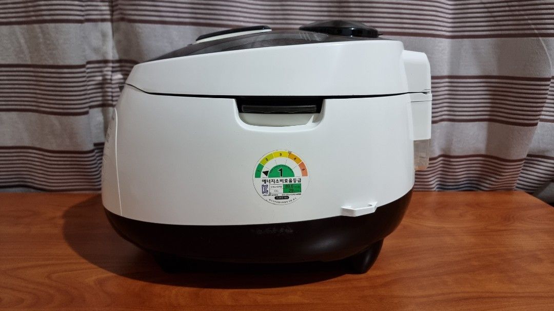 Cuckoo CRP-M109FB Electric Rice Cooker (Category: Cookers) located in Binangonan. Submitted by caaaris (Listing ID 1280191824, Image 3). Description: Cuckoo CRP-M109FB Electric Rice Cooker 10 cups 220 volts 1150 watts With slight tear on the water condensate cup and can be seen in the 9th picture With signs of usage, scuffs, scratches and stain. Inner pot is also faded, with stains and scratches. In very good condition All functions are working.