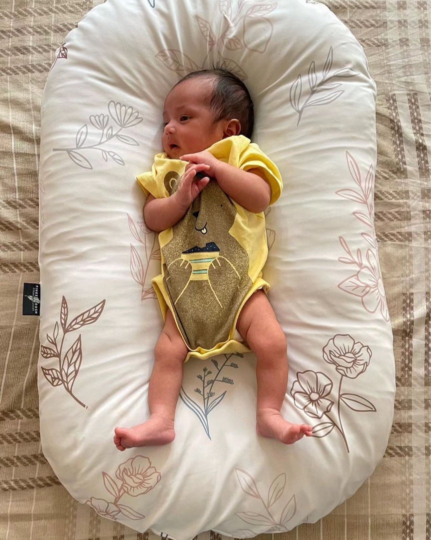 Infant snuggler deals