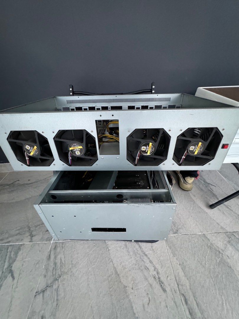 GPU Rig Riserless Case 8 slots (Category: Other Accessories) located in Klang. Submitted by azackliew (Listing ID 1280186906, Image 2). Description: Riserless Case for 8 GPU Slot B75 Platform (65mm) - Dimension 70x38x17cm - Weight 7KG+- - 8 slot riserless board for GPU - 65mm Gap for GPU Slot - Intel CPU - 4GB DDR3 Ram - 4×120mm Fan - 4 × USB 2.0 Port - 1 x VGA Port - 1 x Ethernet Port - 1x mSATA SSD Slot.