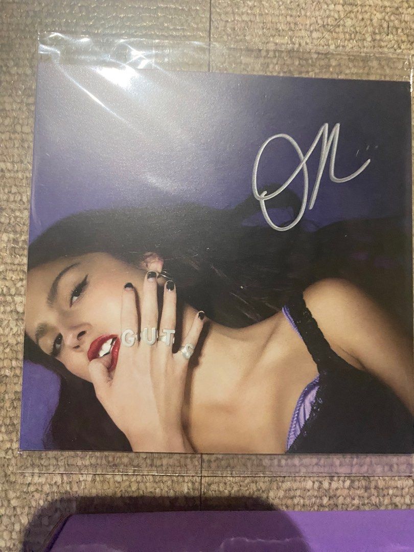 Guts Signed Album package Olivia Rodrigo SEALED (Category: CDs & DVDs) located in Las Pinas. Submitted by averyyes.13 (Listing ID 1280196769, Image 2). Description: SEALED Hand-signed GUTS album/CD by Olivia Rodrigo Includes: CD/album, Signed artcard, casette.