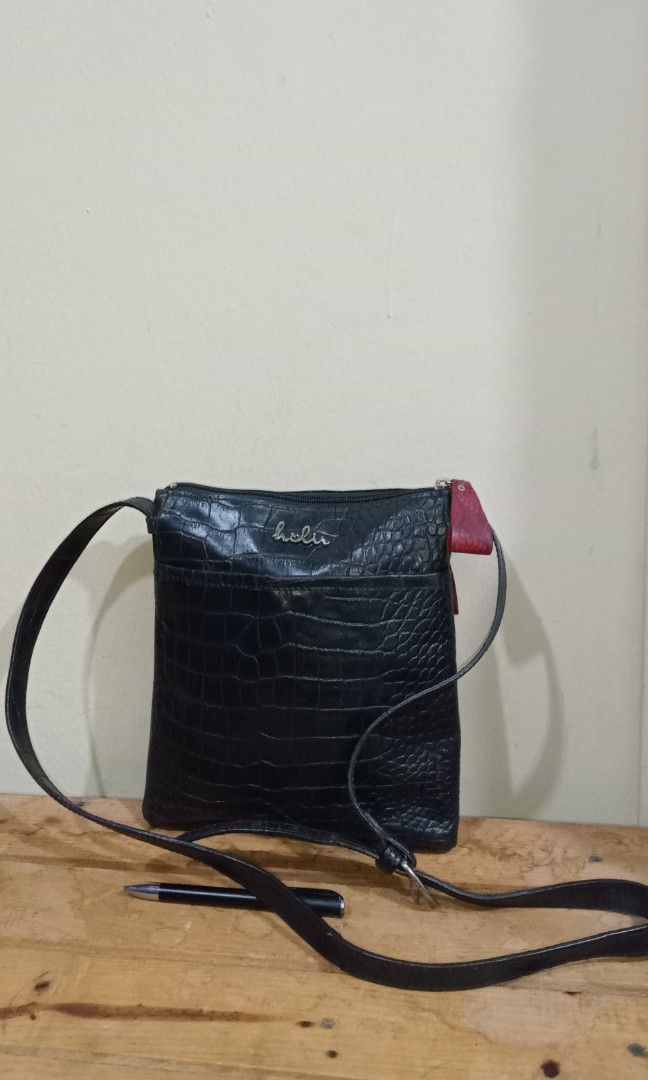 Holi sling bag top