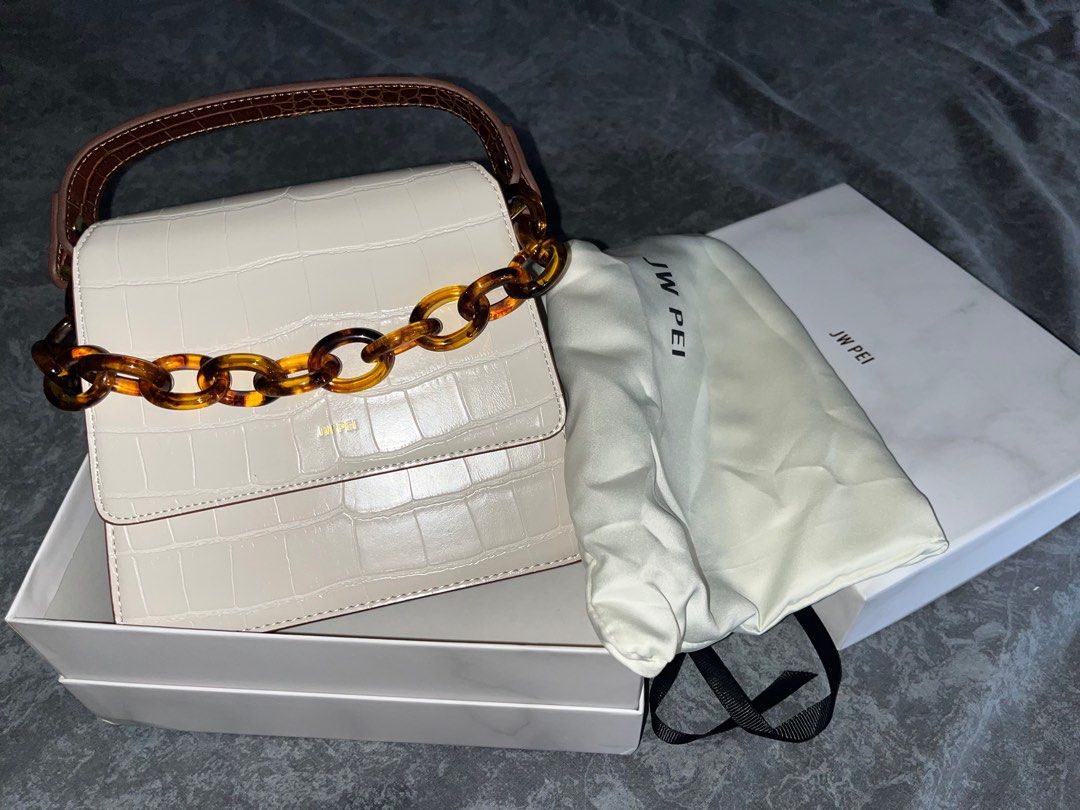 JW Pei Top Handle Fae Bag (Category: Luxury Bags & Wallets) located in Carmona. Submitted by reesejaegger (Listing ID 1280041496, Image 1). Description: Perfect for formal wear Complete inclusions - 3 straps, dust bag and box Minimal usage, condition 9.5/10 Bought from ig shop @secondaveph Message me for more photos..