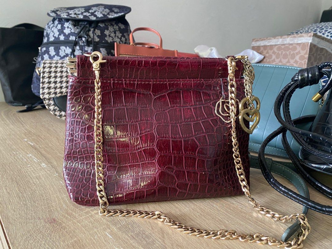 Maroon leather sales handbag