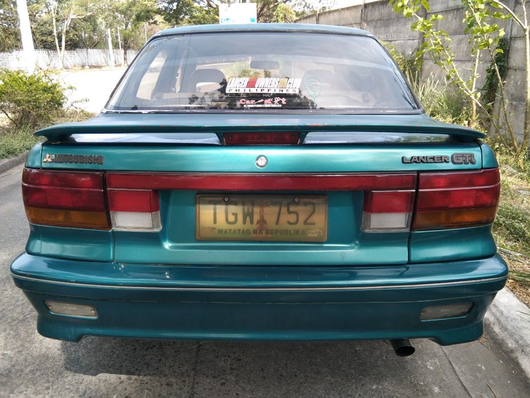 Mitsubishi Lancer 1.5 GLXI Manual (Category: Used Cars) located in Manila. Submitted by rogerguzma89302 (Listing ID 1280057969, Image 3). Description: ORIGINAL LANCER GTi 1992 with complete body clads n REAR SPOILER.Owned n maitained by MITSU CARS mechanik when purchased last yr.Stock all ORIG BODY N ENGINE.ECI engine.FUEL INJECTED.MATIPID n sports tunog mufflers.MAGS X15".!Expired Reg.LTO.RUNNING CONDITIOn.NEEDS aircon freon charging.Good headli
