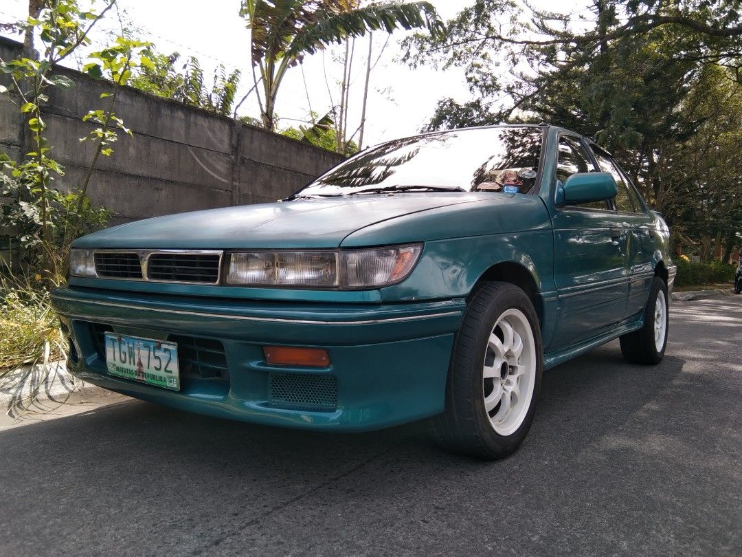 Mitsubishi Lancer 1.5 GLXI Manual (Category: Used Cars) located in Manila. Submitted by rogerguzma89302 (Listing ID 1280057969, Image 2). Description: ORIGINAL LANCER GTi 1992 with complete body clads n REAR SPOILER.Owned n maitained by MITSU CARS mechanik when purchased last yr.Stock all ORIG BODY N ENGINE.ECI engine.FUEL INJECTED.MATIPID n sports tunog mufflers.MAGS X15".!Expired Reg.LTO.RUNNING CONDITIOn.NEEDS aircon freon charging.Good headli