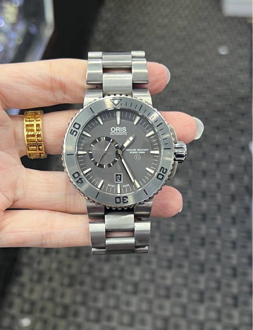 Oris aquis titan small second date 2025