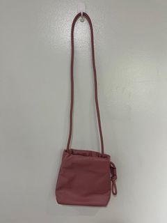 Pink Drawstring Crossbody Bag