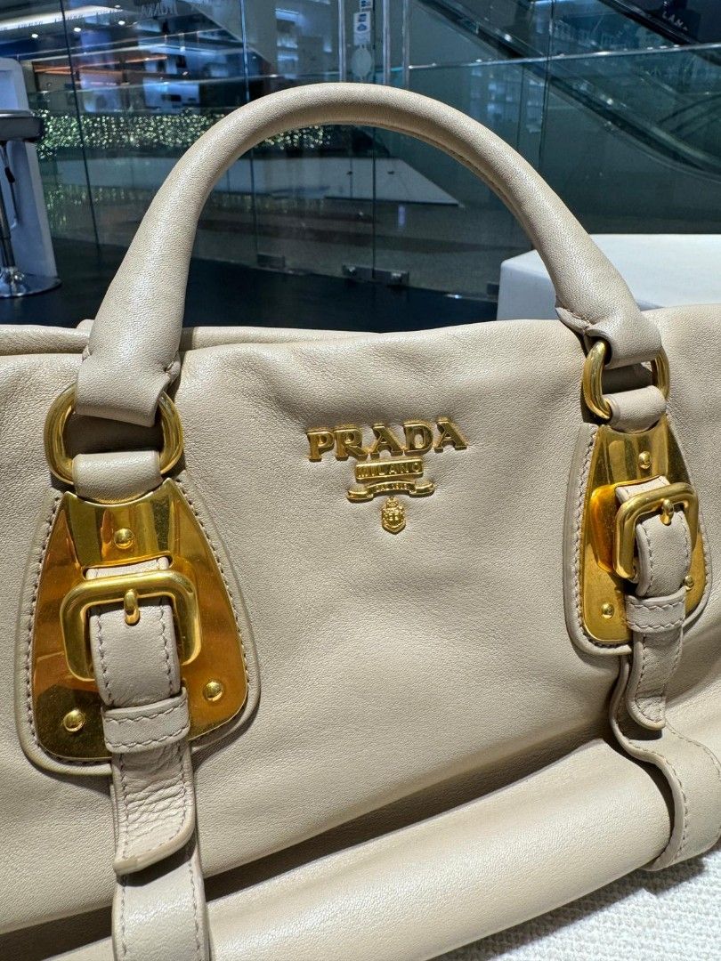 Gold top prada bag