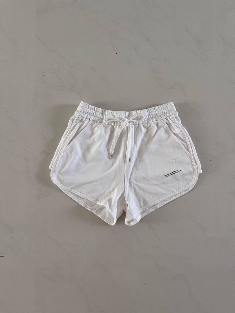 Pretty pure white cotton shorts with pockets. Highly versatile for  lounging, shopping and sports. Grab for only $8!