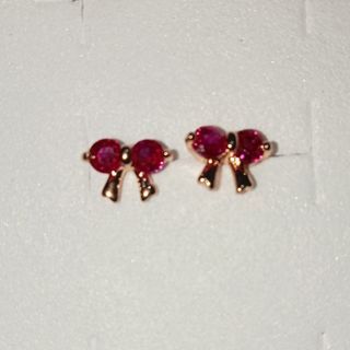Ruby Stud Earrings - Ribbon design. 18K gold plated platinum. UV reactive.