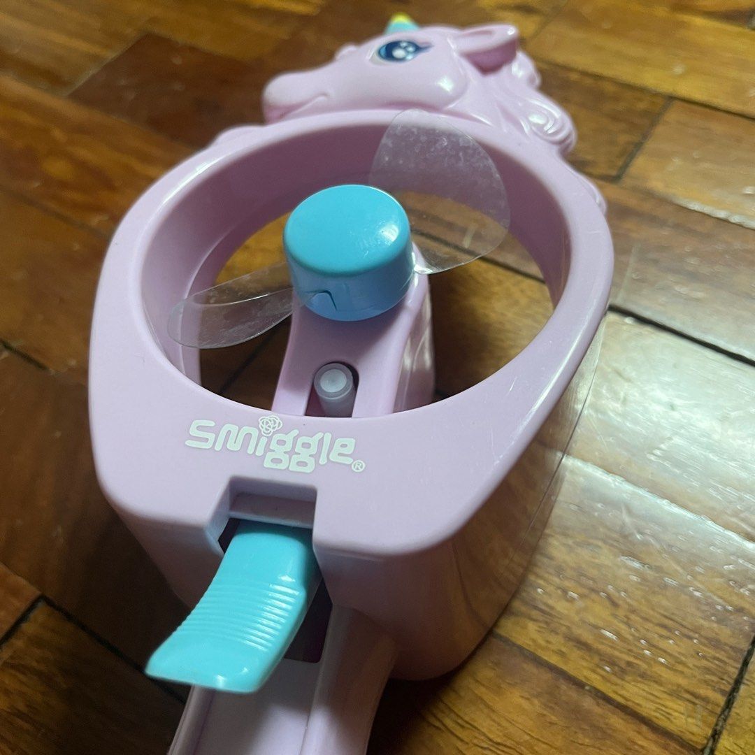 Smiggle portable fan spray (Category: Fans) located in Las Pinas. Submitted by stuffythings (Listing ID 1280231717, Image 2). Description: Smiggle spray good for outdoor use Battery operated Php 180 Pickup las pinas Fan portable kids.