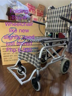 Travel folding wheelchair