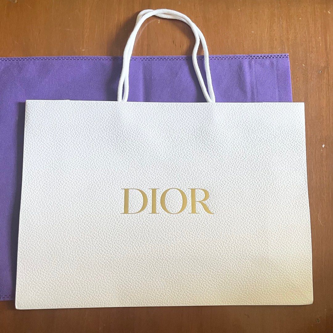 AUTHENTIC LARGE Dior white plain paperbag paper bag gift bag (Category: Makeup) located in Pasig City. Submitted by vanityboutique (Listing ID 1280359848, Image 1). Description: Pm for more details spacious can put several things inside Brand new and authentic Selling low and affordable One of the best selling brands in the makeup skincare perfume world Size is 16.5 inches by 11.8 inches approx Extra large size paperbag .