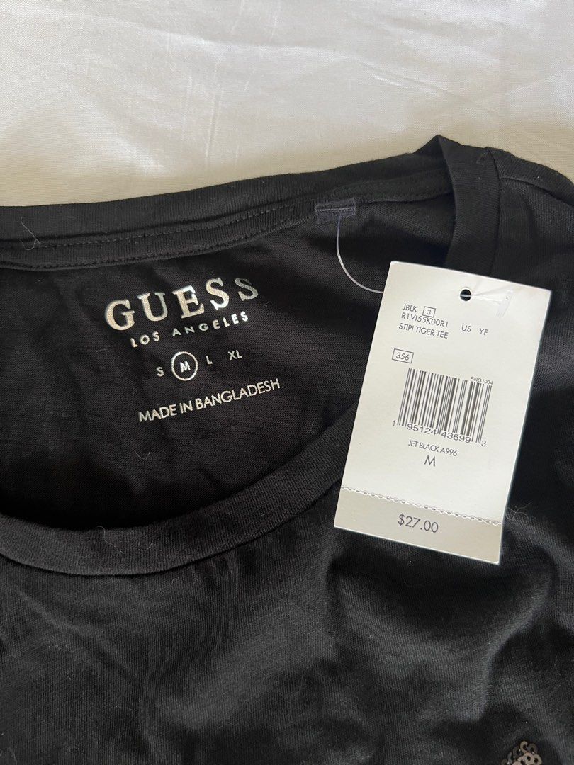 Guess Black Stili Tiger Shirt (Category: Shirts) located in Taytay. Submitted by azlux (Listing ID 1280499326, Image 3). Description: Guess Black Stipi Tiger Shirt Size M L: 24.5" W: 14.5" •Brand new and Authentic w/ Tag •Colors may vary due to lighting •No return/refund, please make sure you are fully decided when purchasing •Shipping to be shouldered by buyer via J&T and Lalamove only •Payment First 📍San Isidro, Taytay, Rizal.