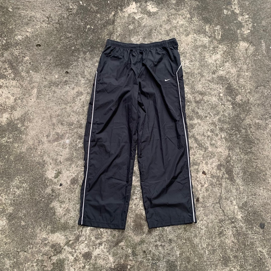 NIKE Track Pants, Men's Fashion, Bottoms, Joggers on Carousell