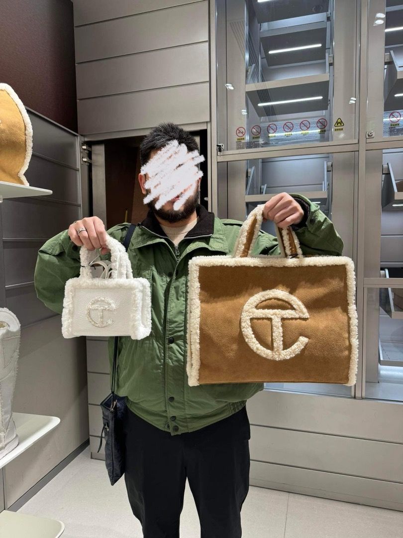 Telfar x Ugg Shopping Bag Medium (Onhand) (Category: Luxury Bags & Wallets) located in Manila. Submitted by designerarchives.ph (Listing ID 1280335610, Image 1). Description: 100% Authentic! Complete! Money back guarantee Color: Brown - this size is hard to find!!! Buyer will shoulder the shipping fee Actual photo posted!!.