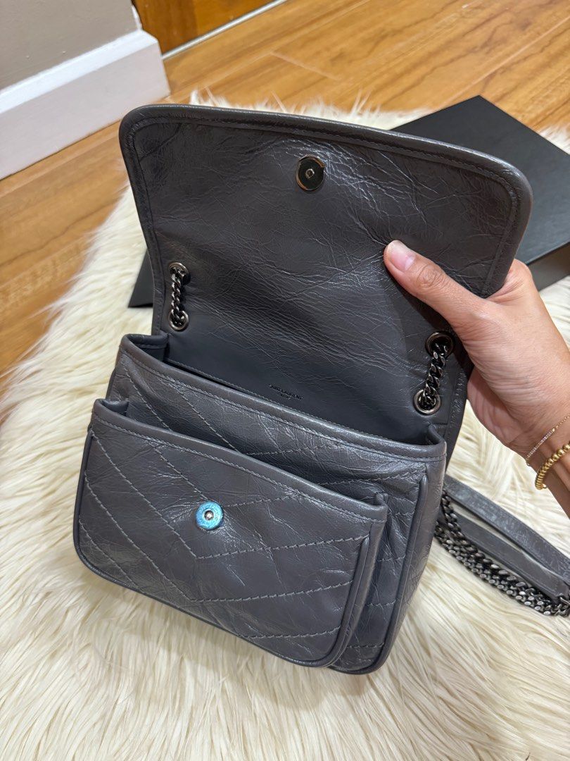 YSL Niki Baby (Category: Luxury Bags & Wallets) located in Cebu City. Submitted by joniiie (Listing ID 1280447874, Image 3). Description: 10/10 condition no flaws, no rubs complete with receipt (no paperbag) .