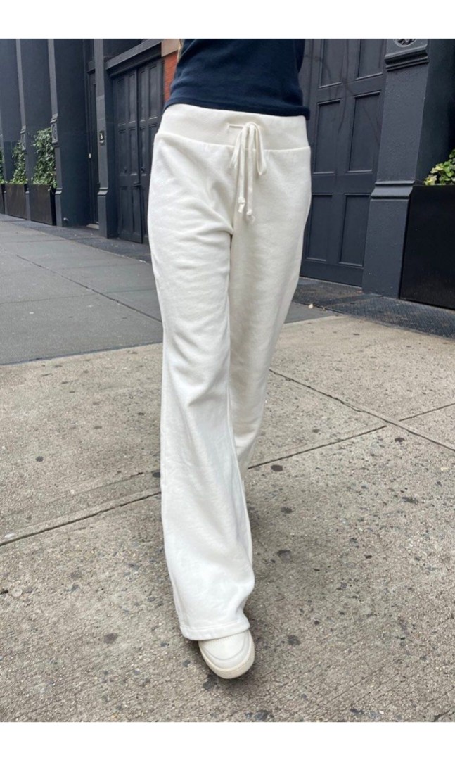 Brandy melville hillary long yoga sweatpants boot cut flare low waist  leggings white soft cream, Women's Fashion, Bottoms, Jeans & Leggings on  Carousell