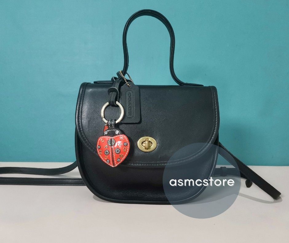 Coach Vintage BellaCourt in Black (Category: Luxury Bags & Wallets) located in Marikina City. Submitted by asmcstore (Listing ID 1280781334, Image 1). Description: Coach Vintage BellaCourt in Black Made in the United States August 1994 **LADYBUG CHARM NOT INCLUDED** **These are VINTAGE/PRELOVED bags signs of usage might be present** **Bags are cleaned and conditioned**.