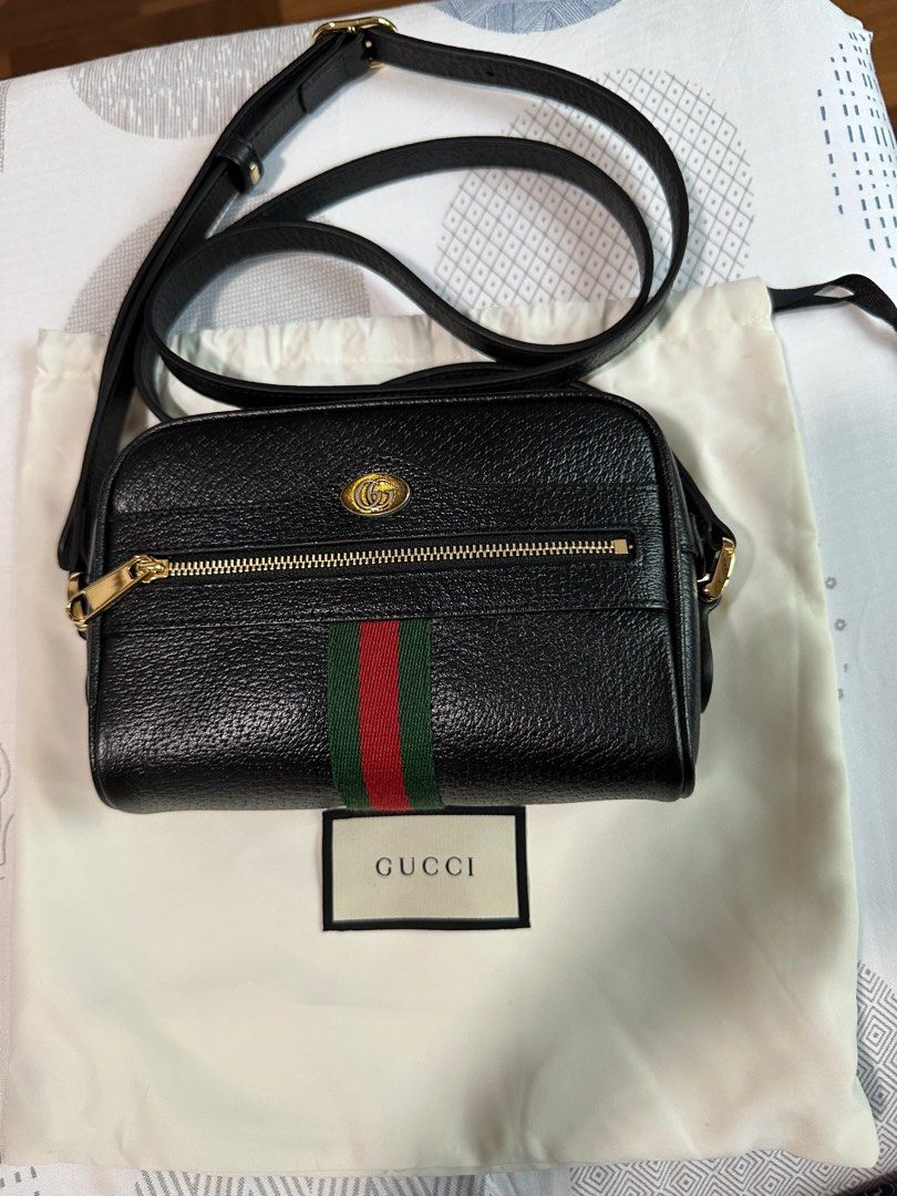 GUCCI OPHIDIA MINI SHOULDER BAG - black leather (Category: Bags & Wallets) located in Singapore. Submitted by cottoncandy8888 (Listing ID 1280698164, Image 1). Description: 100% authentic Gucci bag in black leather. Brand new. Not used before. Comes with original box, dust bag and paper bag. Only sincere buyer pls. No lowballers. Able to deliver except Tuas. Meet up at Raffles Place / Downtown MRT on certain weekdays only or Buangkok MRT..
