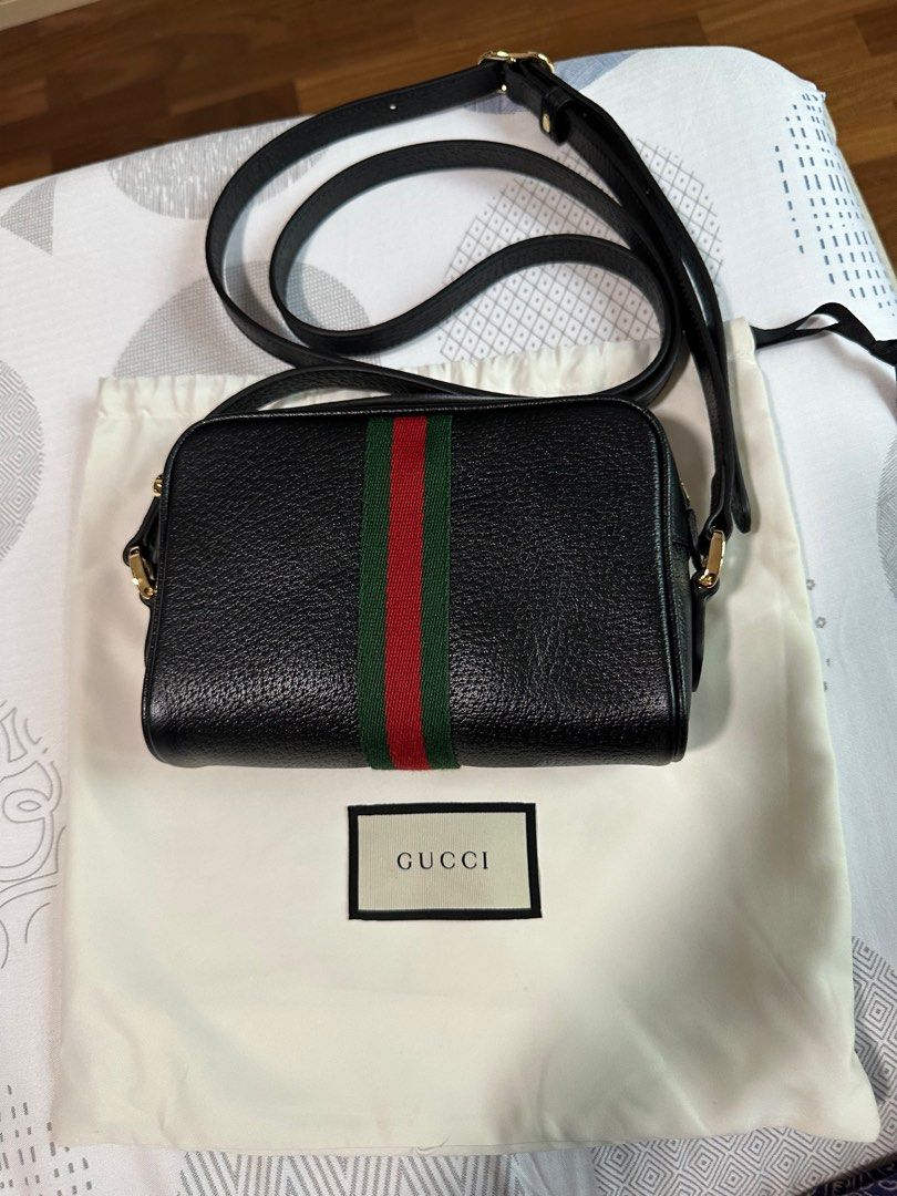 GUCCI OPHIDIA MINI SHOULDER BAG - black leather (Category: Bags & Wallets) located in Singapore. Submitted by cottoncandy8888 (Listing ID 1280698164, Image 2). Description: 100% authentic Gucci bag in black leather. Brand new. Not used before. Comes with original box, dust bag and paper bag. Only sincere buyer pls. No lowballers. Able to deliver except Tuas. Meet up at Raffles Place / Downtown MRT on certain weekdays only or Buangkok MRT..