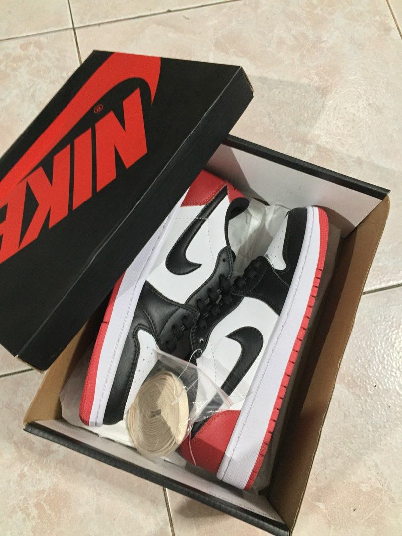 j1 low black toe price