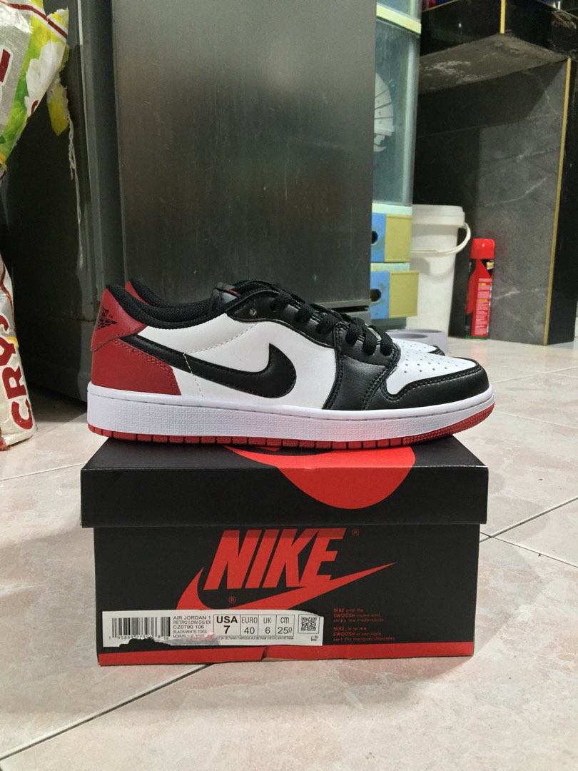 black and white jordan 1 champs