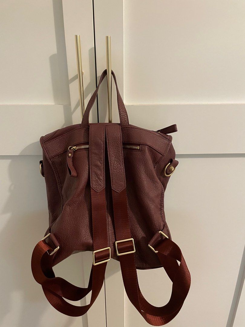 Maroon Backpack (Category: Backpacks) located in Singapore. Submitted by adelyn.kong (Listing ID 1280782863, Image 2). Description: Full leather haversack, lightly used for sale.