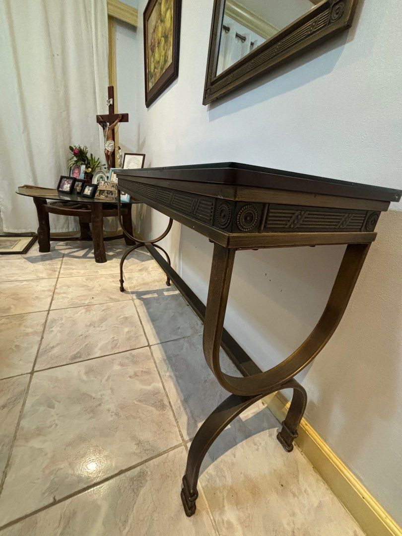 Neoclassical style brass console table with matching mirror (Category: Other Home Furniture) located in Marikina City. Submitted by micharon (Listing ID 1280728075, Image 3). Description: Made of brass and wood with glass top Durable This has been used for more than a decade. Please expect signs of use L 122cm W 38cm MOP BPI or Gcash only Pick up via Lalamove or transportify L300 📍Santolan, Pasig City (near LRT 2 Santolan Station).
