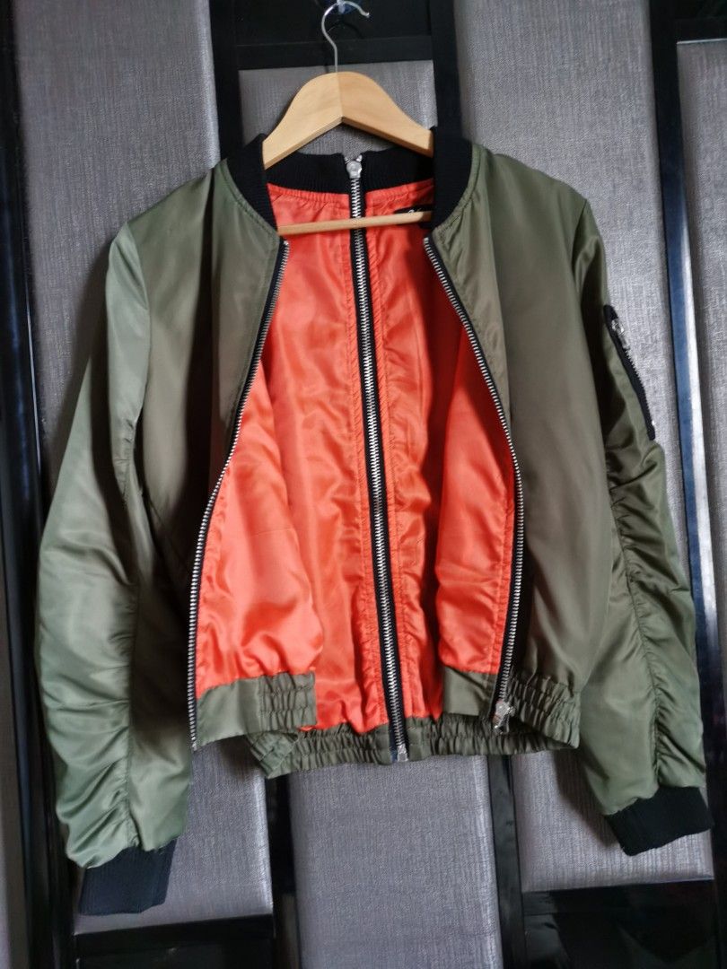 Green bomber jacket discount with orange inside