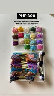 Assorted threads, some are DMC threads