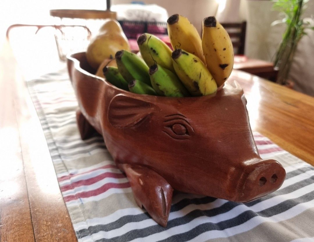 Filipino table decor fruit tray (Category: Food Organization & Storage) located in Bulacan. Submitted by iamolivia_p (Listing ID 1275926482, Image 1). Description: Made of solid wood, can be used as fruit platter or fruit display boil, or as a decorative item. Discoloration as seen on last photo, can be re-varnished or apply wood stain size:Approx 41cm L x 19.5cm W x 12cm H.