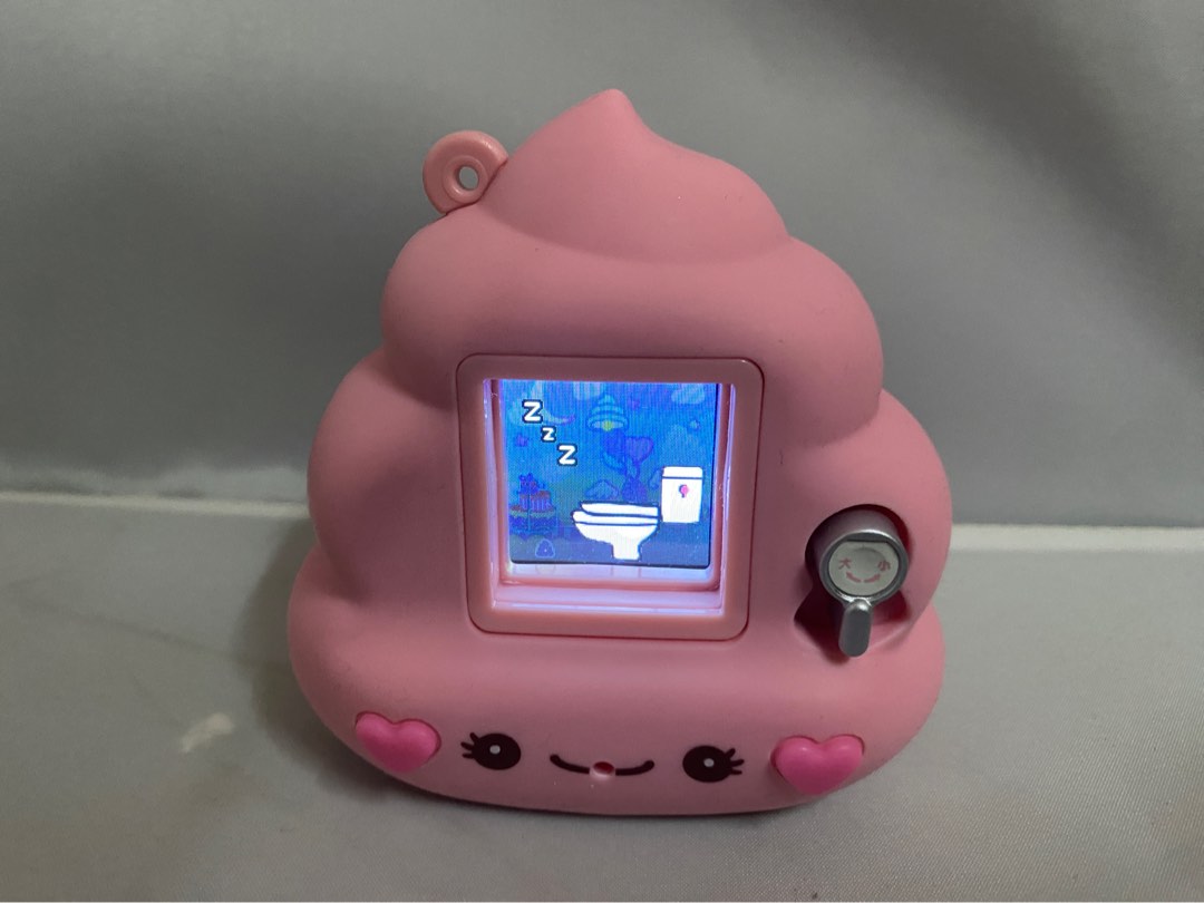 fluffy pink poop tamagotchi virtual pet, Hobbies & Toys, Toys