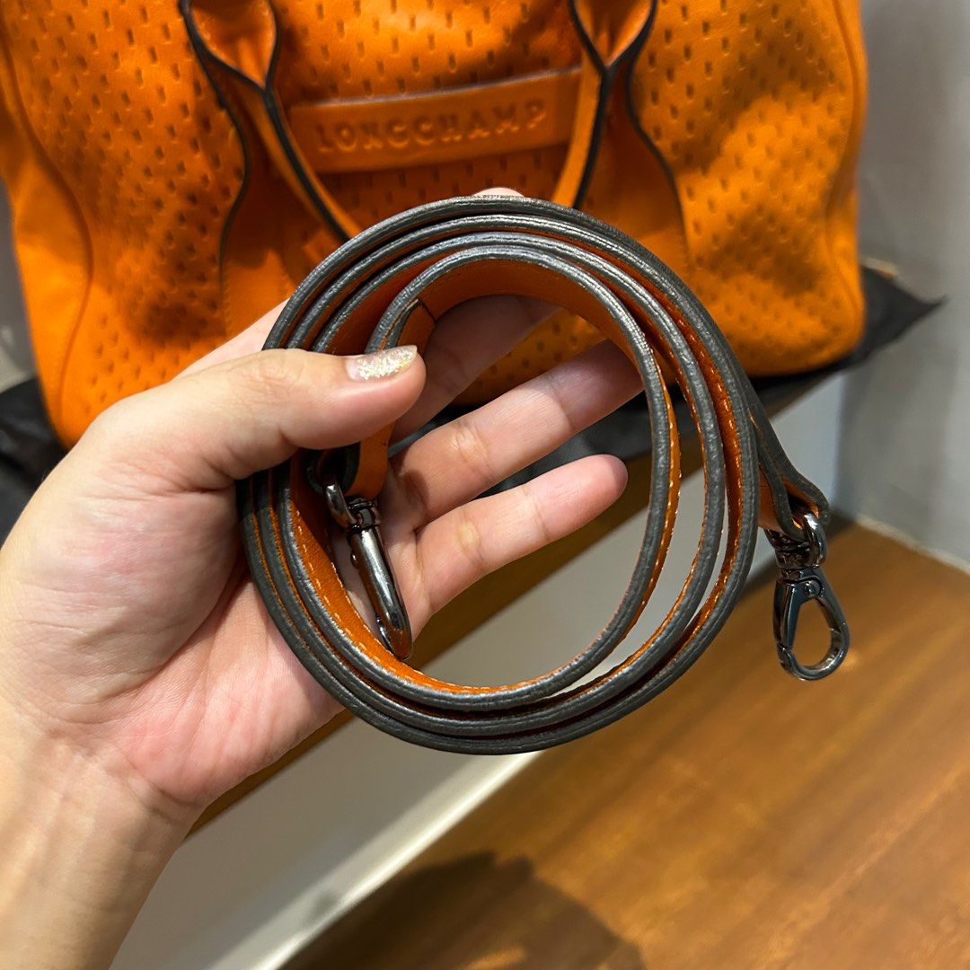 Longchamp 3D perforated bag with strap (Category: Luxury Bags & Wallets) located in General Trias. Submitted by shop.nikki (Listing ID 1276020862, Image 3). Description: AUTHENTIC bought at Duty Free inclusion: generic dust bag flaw: tiny watermark (unnoticeable).