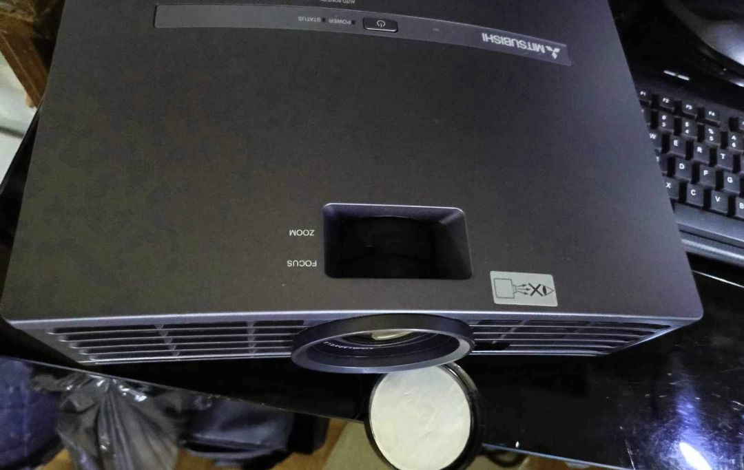 Projector Mitsubishi model: XD490U (Category: Projectors) located in Bacoor. Submitted by stargate01 (Listing ID 1275962472, Image 3). Description: Projector Mitsubishi model: XD490U The Best for Theater - Cinema Projectors Introducing the Mitsubishi XD490U, an ultra-portable XGA DLP projector that promises an exceptional visual experience. With its impressive 2500:1 contrast ratio and 3000 ANSI lumens, this projector delivers a bright and vivid 