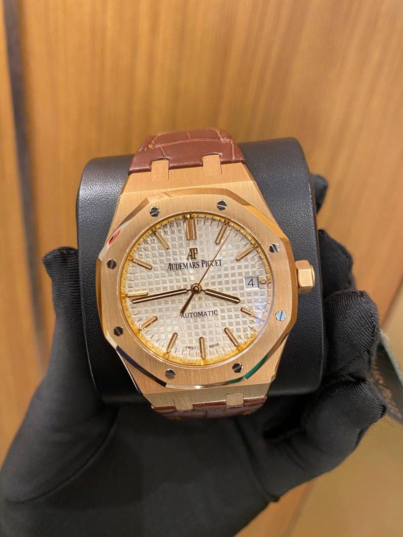 Ap royal oak on sale rose gold white face