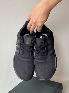 Nmd xr1 hot sale triple black malaysia
