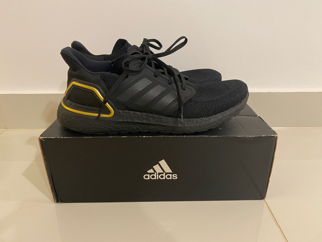 Ultra boost black and gold hot sale