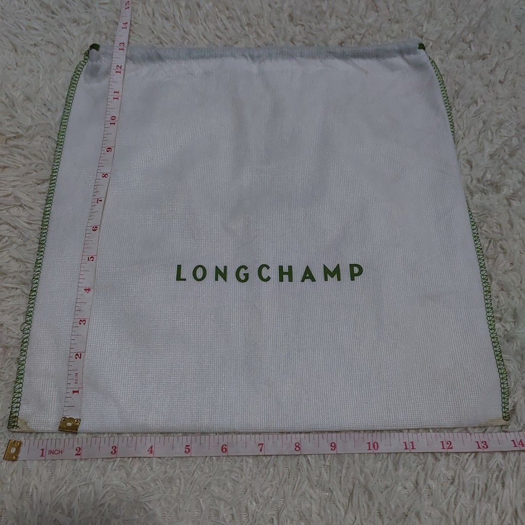 Authentic Longchamp dust bag 13x14 inches (Category: Luxury Bags & Wallets) located in Manila. Submitted by jfluxury.co (Listing ID 1280877826, Image 3). Description: excellent condition no flaws bought in Japan 🇯🇵 💯% Authentic. 😊 Money back guarantee. 😊 Clean and ready to use na po.