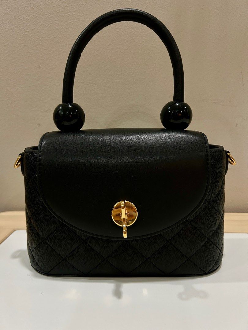 Charles Keith Round Quilted Top Handle Bag