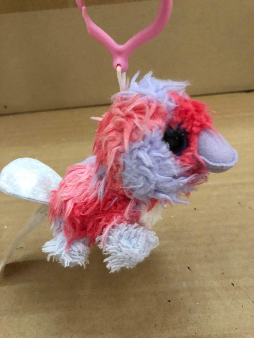 Furry bird toy top