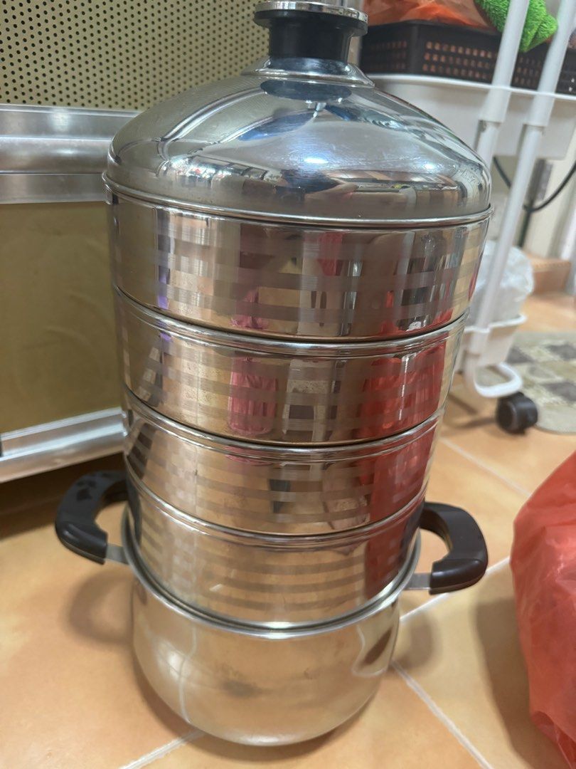 Multi layer Steamer (Category: Cookware & Accessories) located in Singapore. Submitted by lsharon18 (Listing ID 1280813437, Image 1). Description: Have not been using for very long. Good stainless steel multi layer steamer. Self collection only no no meet up. .