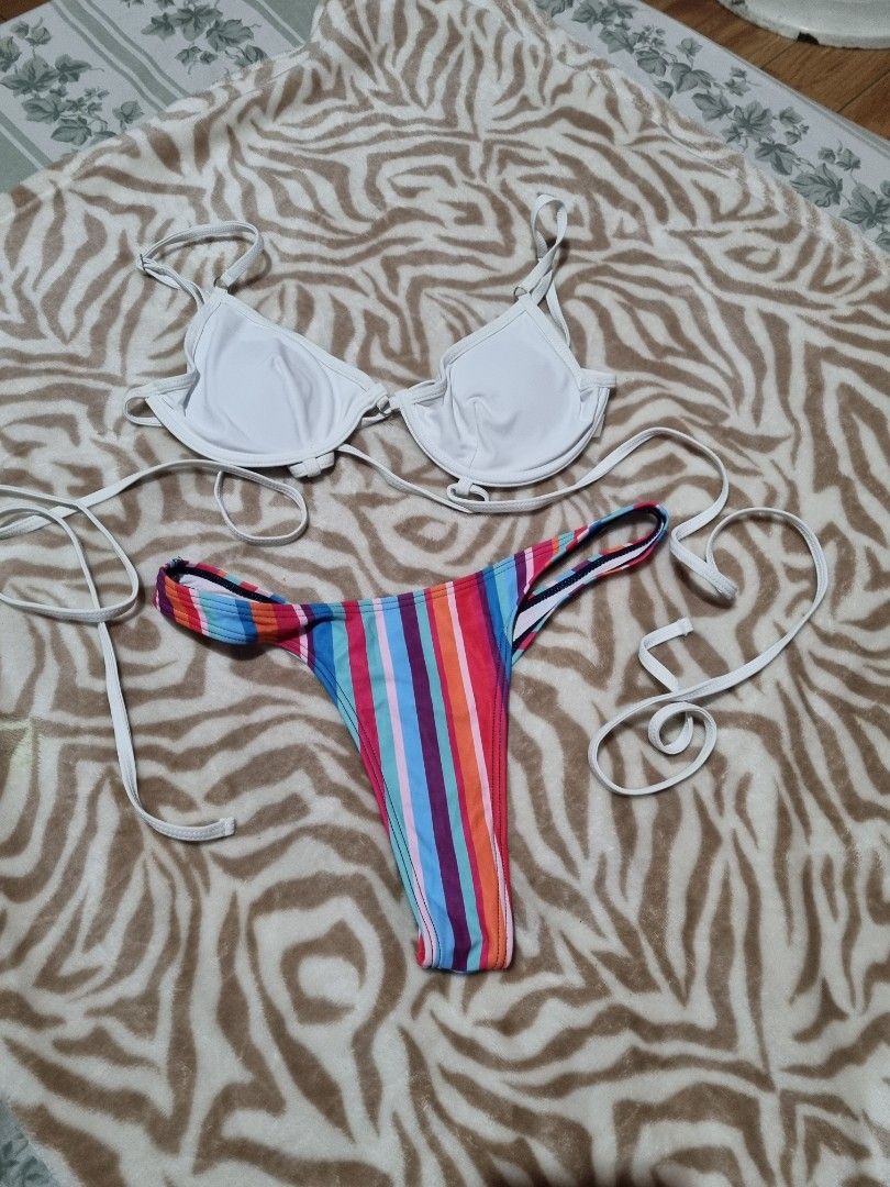 Preloved Bikinis (Category: Bikinis & Swimsuits) located in Manila. Submitted by engrap (Listing ID 1280815405, Image 3). Description: Used once Size S-M 150 each pair.