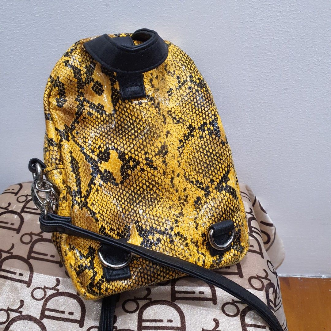 Preloved Mini Backpack Black and Yellow Snakeskin Women s Fashion Bags Wallets Cross body Bags on Carousell