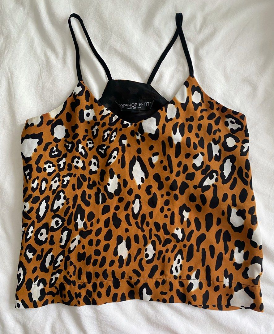 Topshop Leopard Print Racer Back XXS (Category: Sleeveless) located in Makati City. Submitted by style.cents (Listing ID 1280787525, Image 1). Description: Topshop Leopard Print Racer Back Size: Petite, XXS In good condition .